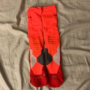Hot Pink, Red, and Gray Nike Elites